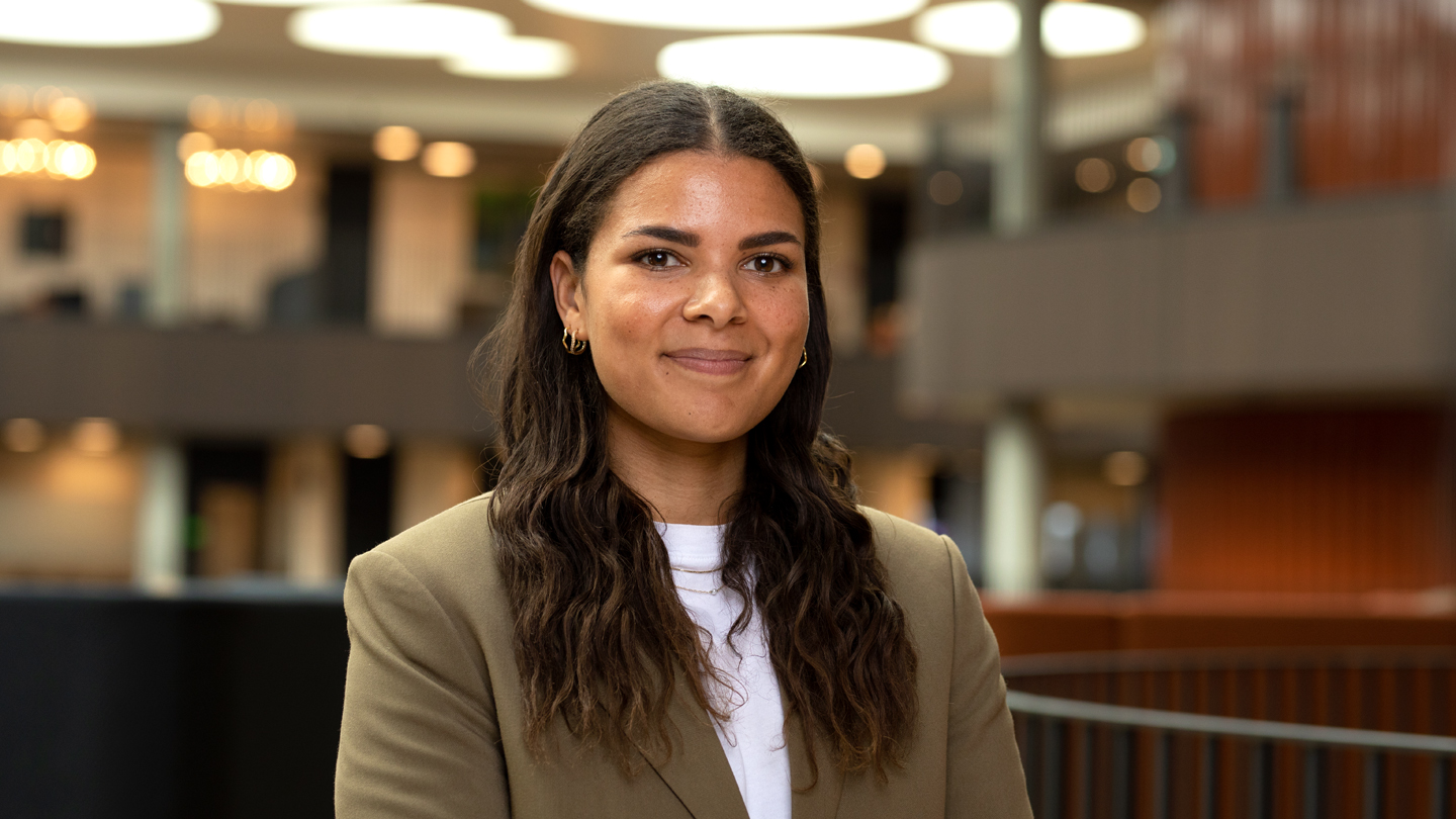 Woman looking into camera smiling