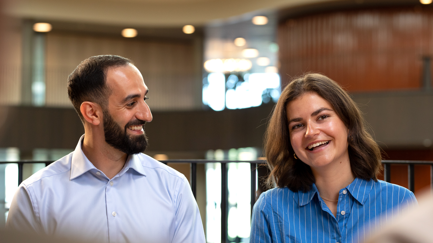 Man and woman smiling
