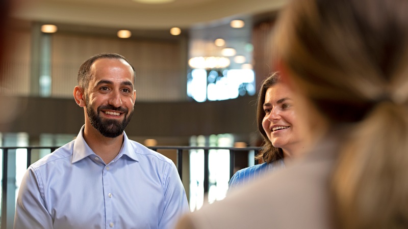 Two young people smiling