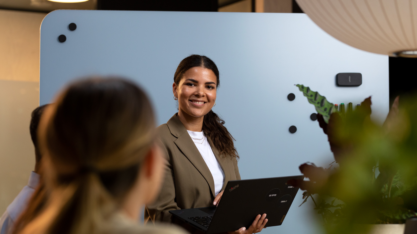 Woman with a computer in the office